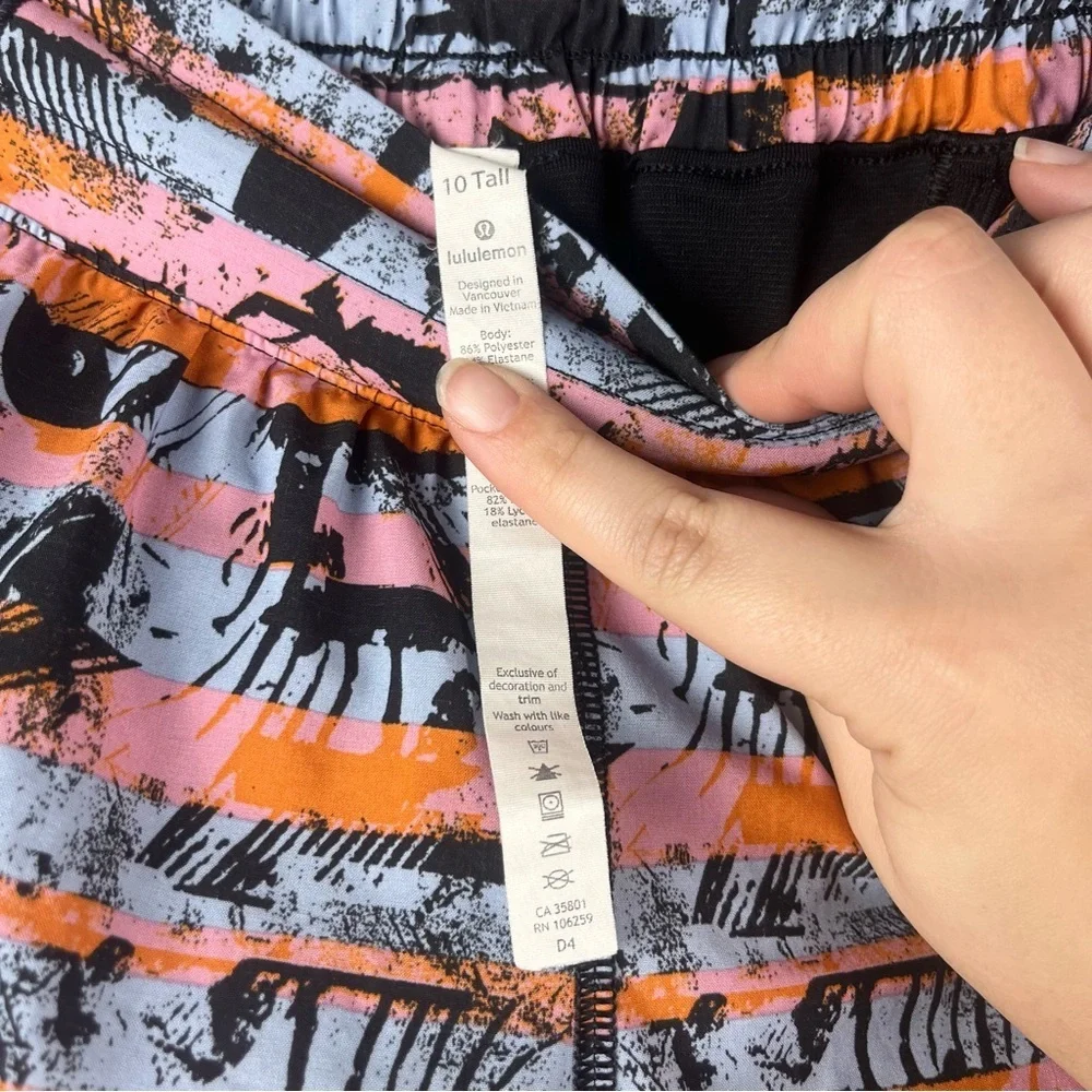 Lululemon Hotty Hot Multi Shorts size 10 tall Black Blue Orange print